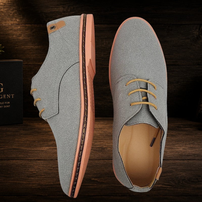 Daily Gent Kensington grey suede leather Oxford dress shoes with tan laces and a peach sole.