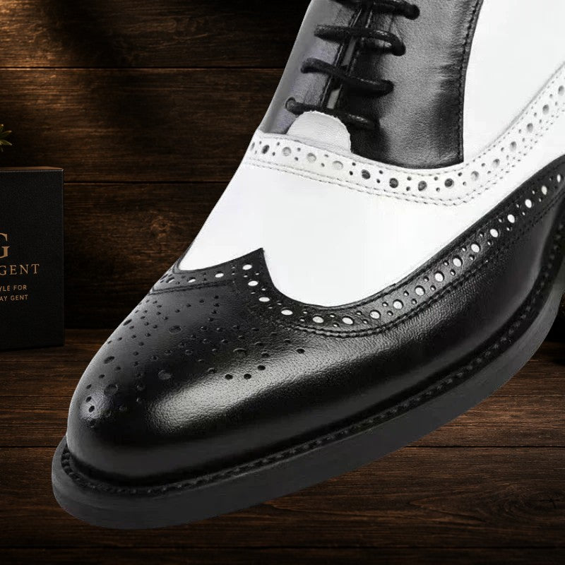 Daily Gent men's black and white leather wingtip derby shoes with brogue detailing.