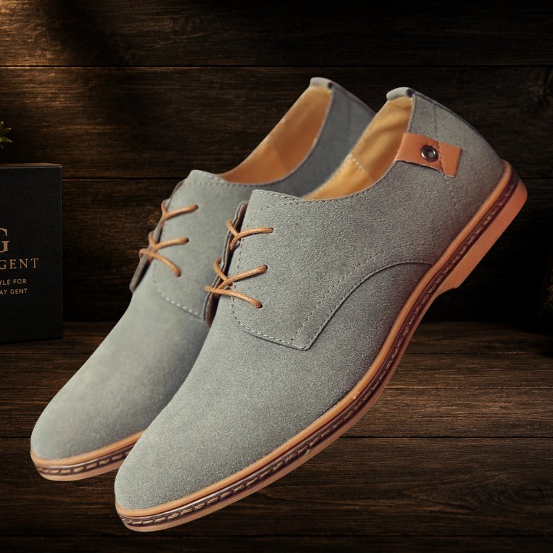Daily Gent Kensington grey suede leather Oxford dress shoes with tan laces and brown sole. Classic lace-up design.
