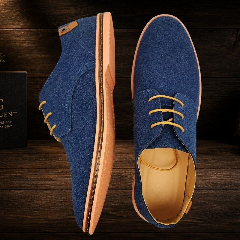 Daily Gent Kensington navy blue suede Oxford dress shoes with tan laces and peach sole.